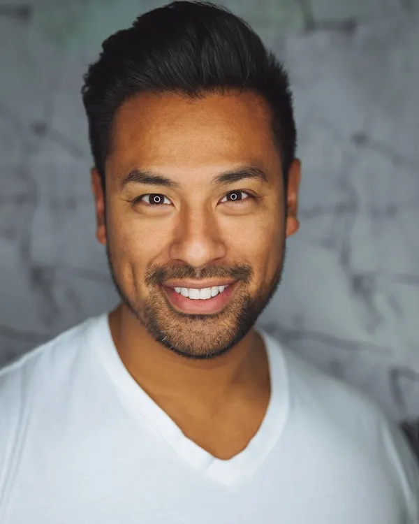 Confident man smiling at camera